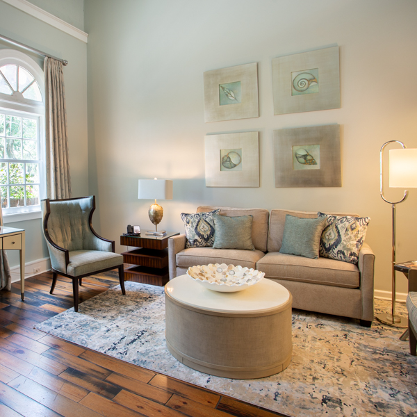 a living room with a couch and a table